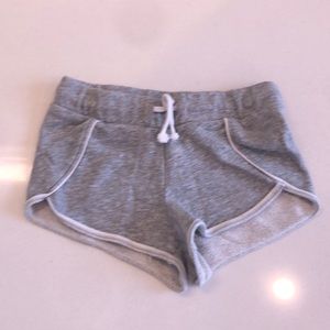 Age 5 shorts. Sweat-shorts. Kind of short. Pretty comfortable.